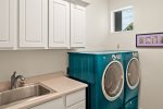 Full laundry room for guest convenience